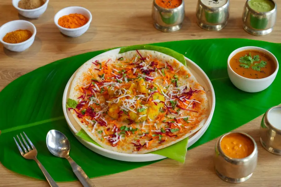 Benne dosa served with traditional South Indian accompaniments