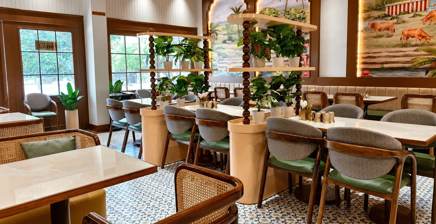 The warmly lit South Masala dining room